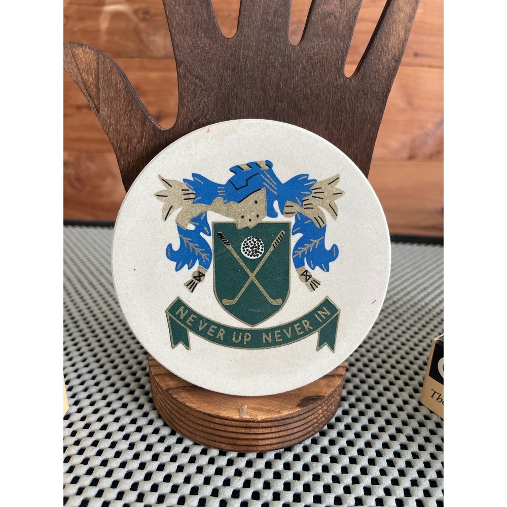 Corestone" brand coaster features a golf crest motto "Never Up Never In" VTG